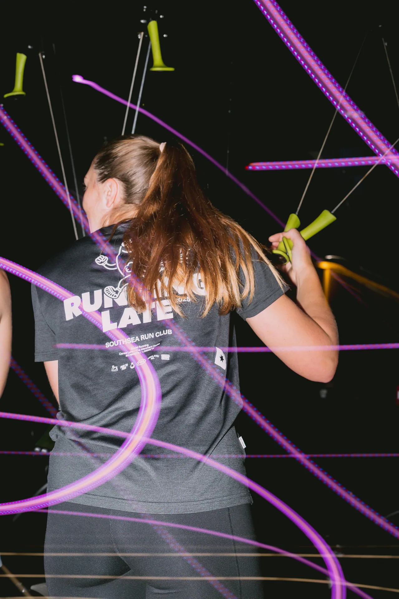 Girl at gym with light effects