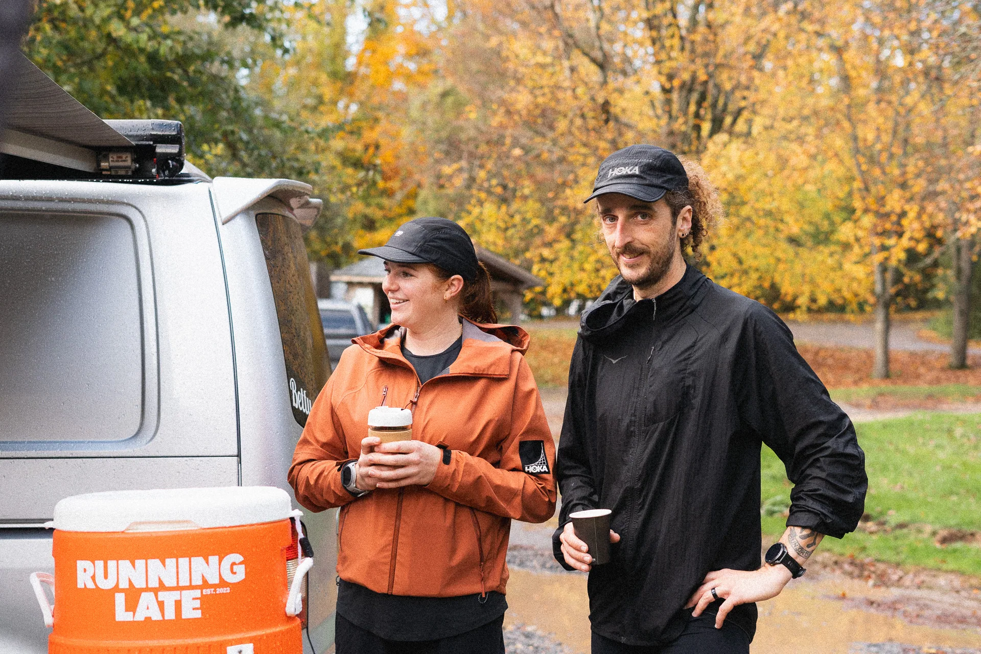 Photo of two runners in forest