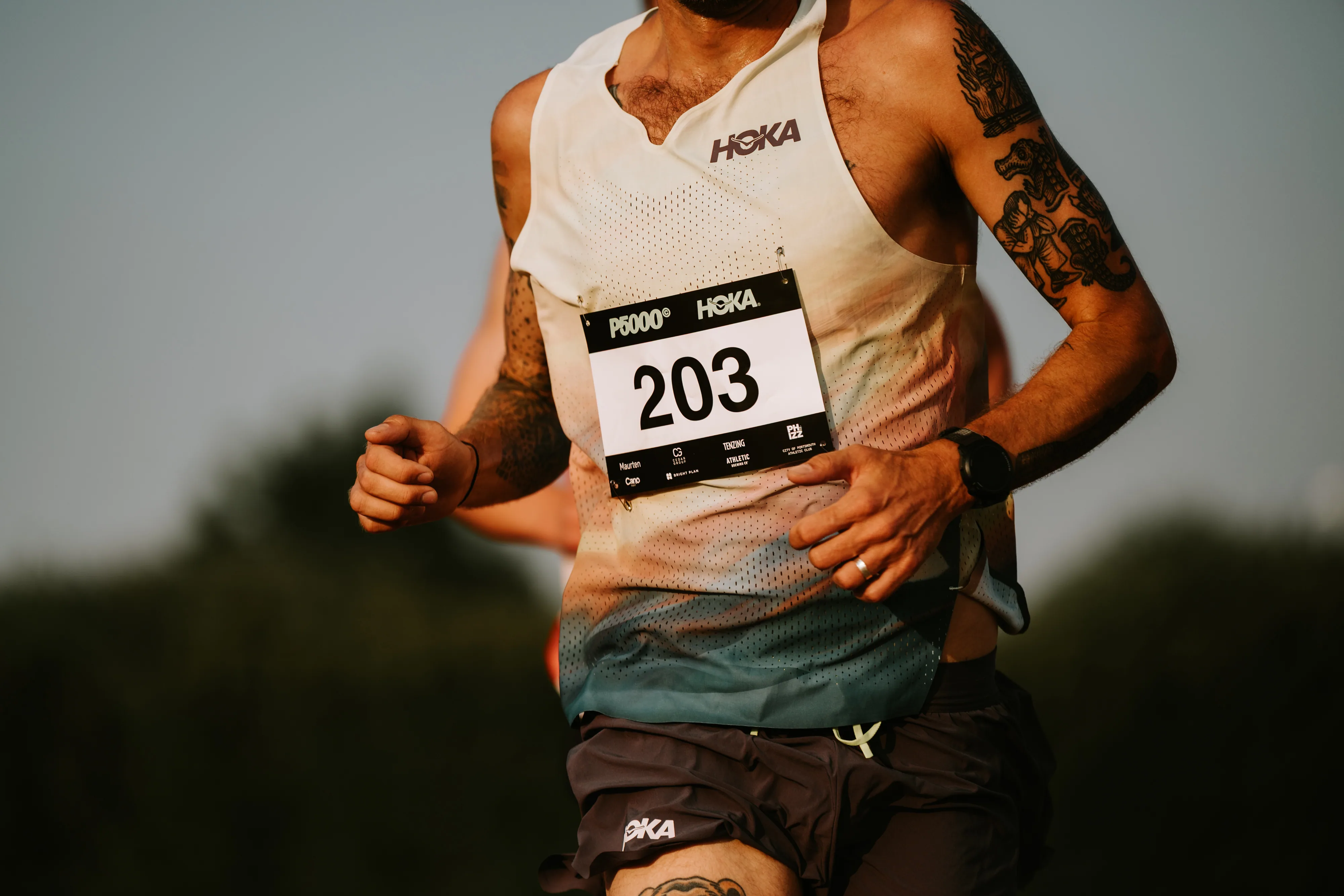 runner with number on running