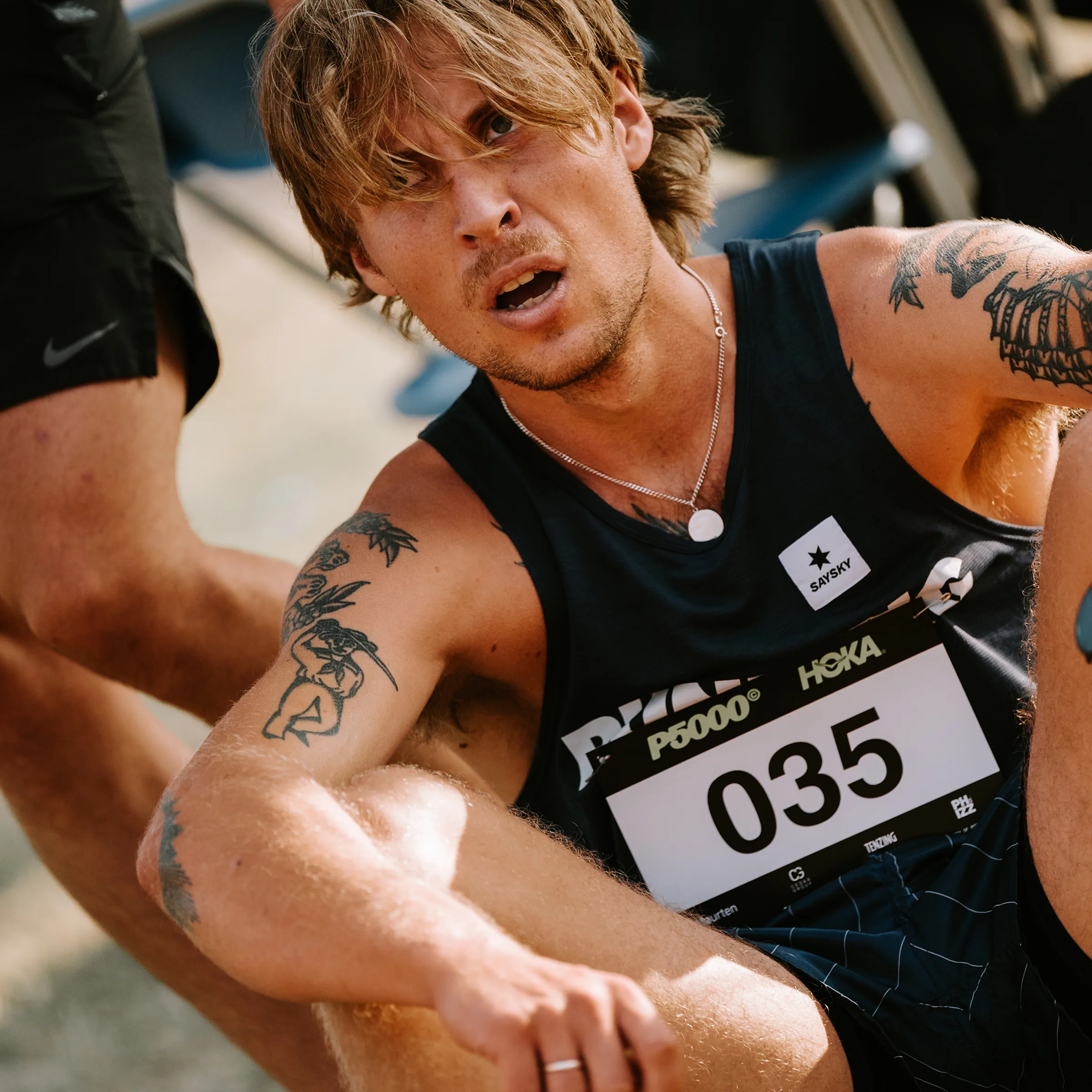 runner sat on ground